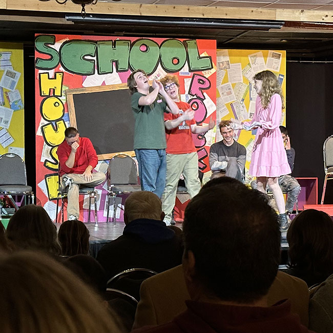 Students with the Olympic Trophy